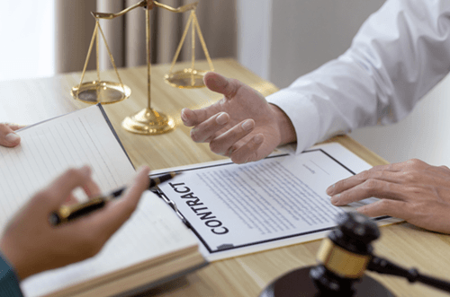 Signing a contract in front of a notary