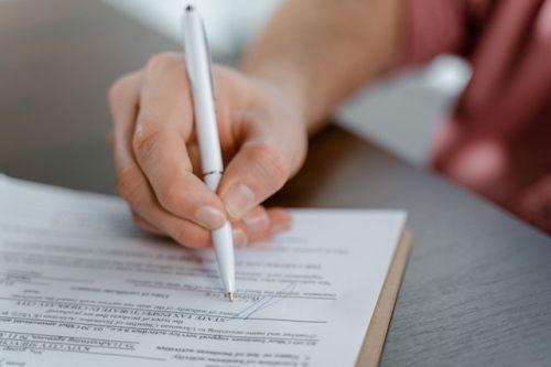 Person signing a brokerage contract