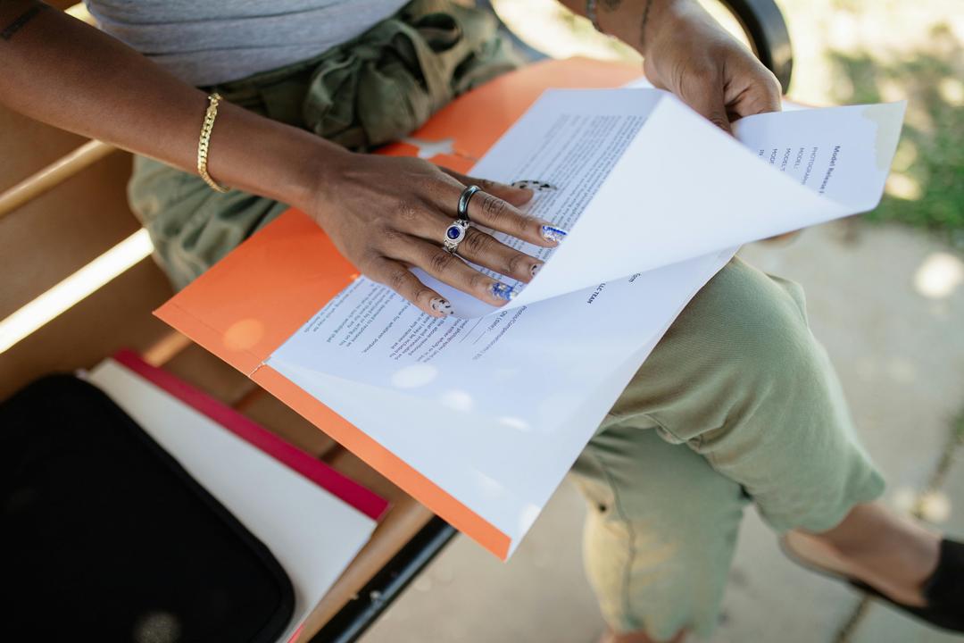 A woman reading a document