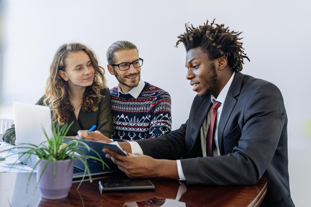 A couple in a meeting with a professional