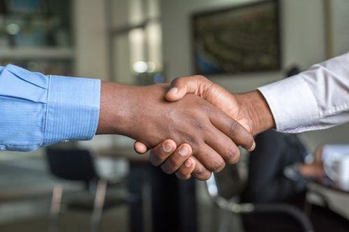 Client and broker shaking hands