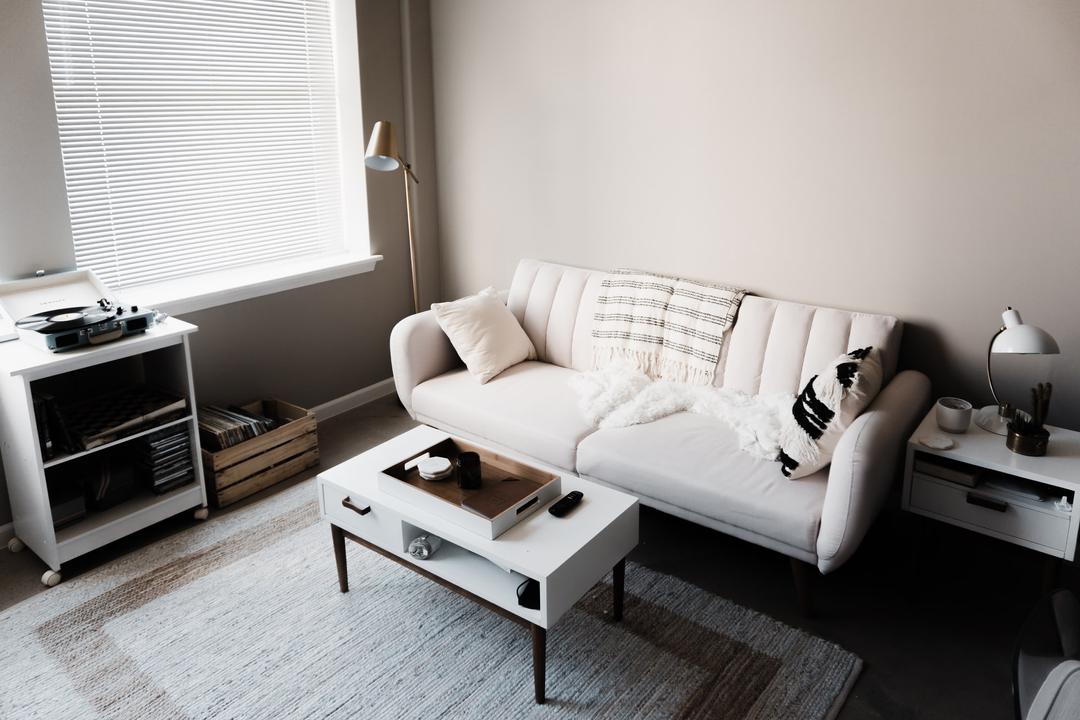 A living room with a white couch