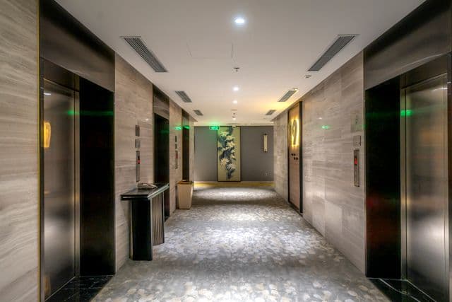 Un vice caché affectant le corridor d'un immeuble est dans une partie commune