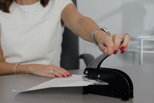 Notary stamping an official document