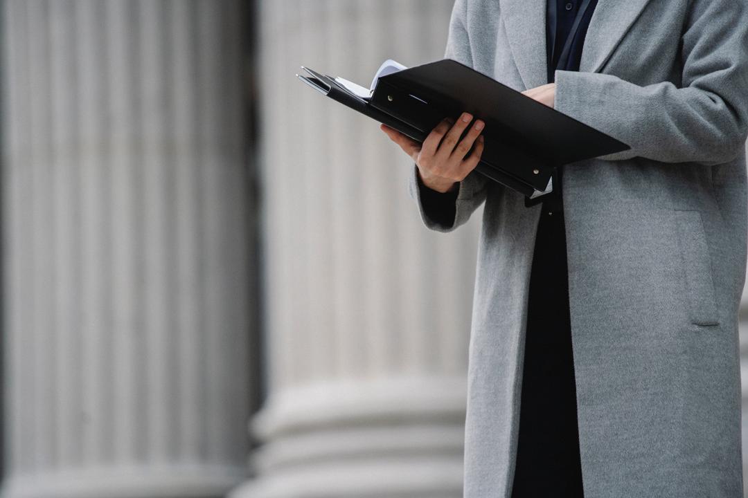 Someone holding a important document