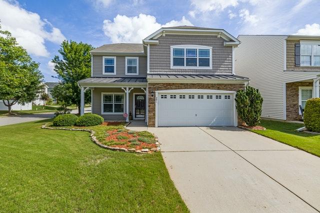 Évaluation immobilière : visite de la maison et du quartier