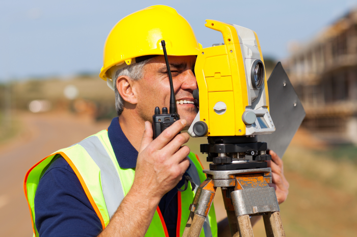 What is the role of a land surveyor?