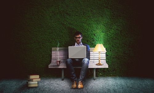 Man looking at his computer