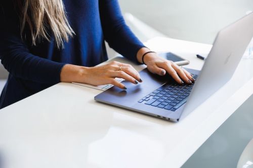 Woman looking at insurers online