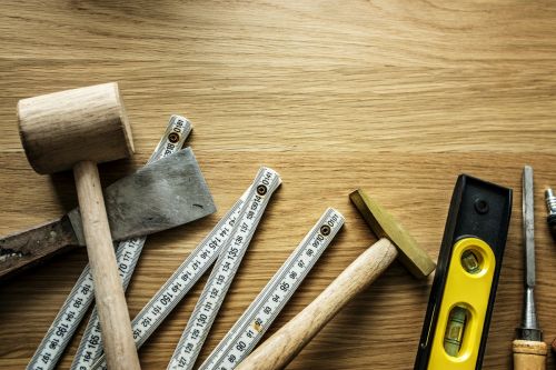 Rénovation et construction d'un condo : pourquoi faire appel à un arpenteur