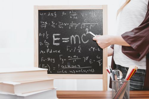 Calculations written on a blackboard