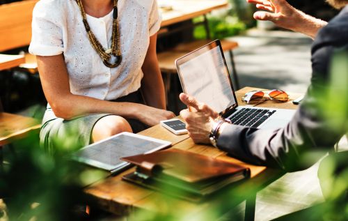 The mortgage broker explaining mortgage rules to a client