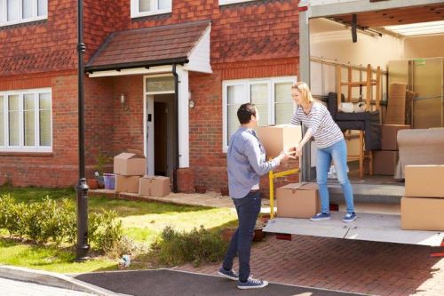 Couple moving in a new house