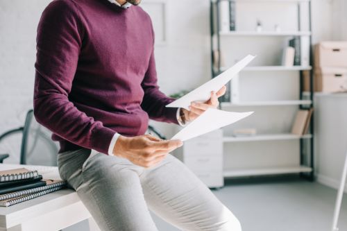 Man looking at papers